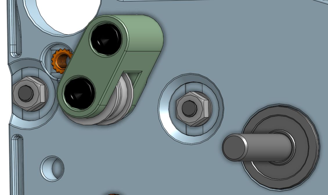 Belt idler frame with bearings installed in the frame recesses